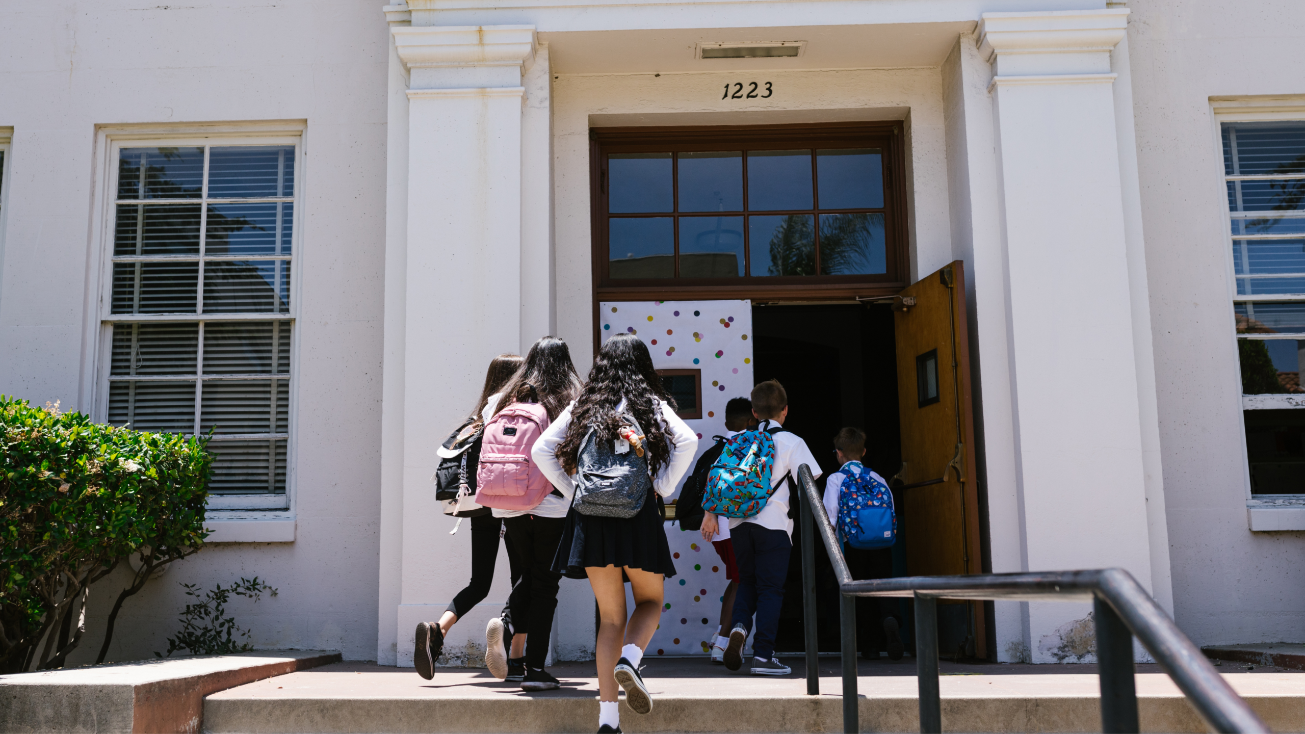 children going into school